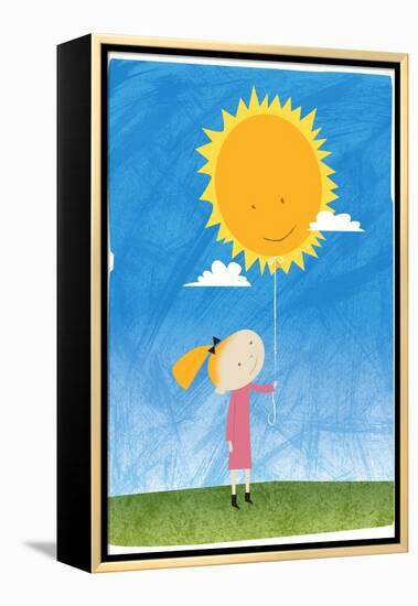 Girl holding a sun balloon-Harry Briggs-Framed Premier Image Canvas