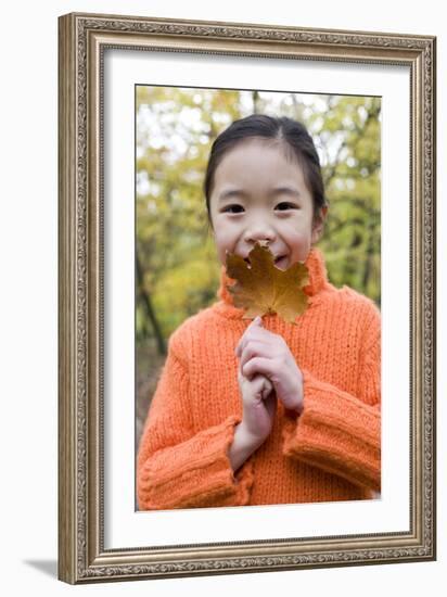 Girl Holding An Autumn Leaf-Ian Boddy-Framed Photographic Print