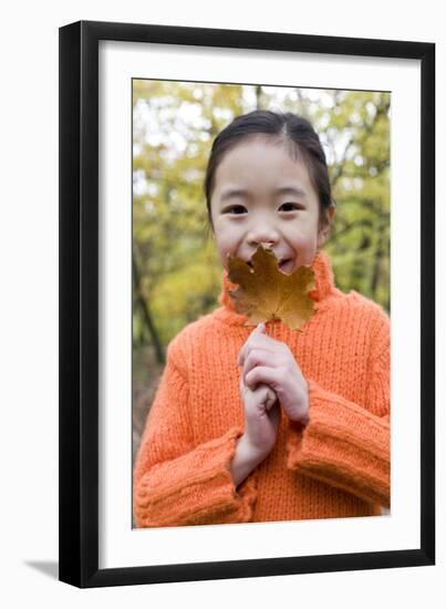 Girl Holding An Autumn Leaf-Ian Boddy-Framed Photographic Print