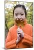 Girl Holding An Autumn Leaf-Ian Boddy-Mounted Photographic Print