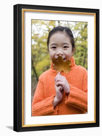 Girl Holding An Autumn Leaf-Ian Boddy-Framed Photographic Print