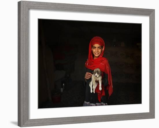 Girl Holds a Puppy as the Sun Sets over Kabul's Impoverished Teppe Maranjan Neighborhood-null-Framed Photographic Print