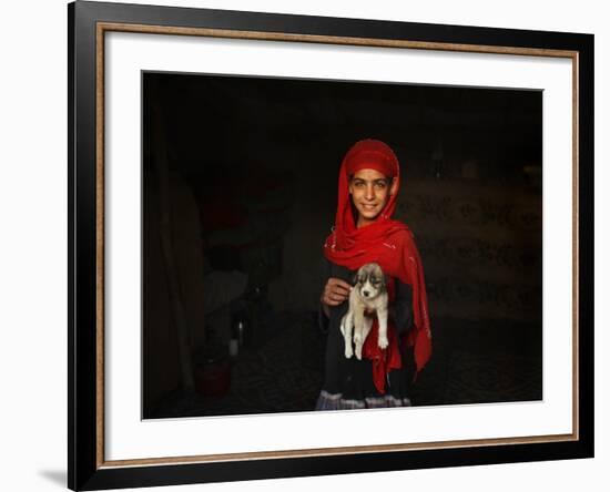 Girl Holds a Puppy as the Sun Sets over Kabul's Impoverished Teppe Maranjan Neighborhood-null-Framed Photographic Print