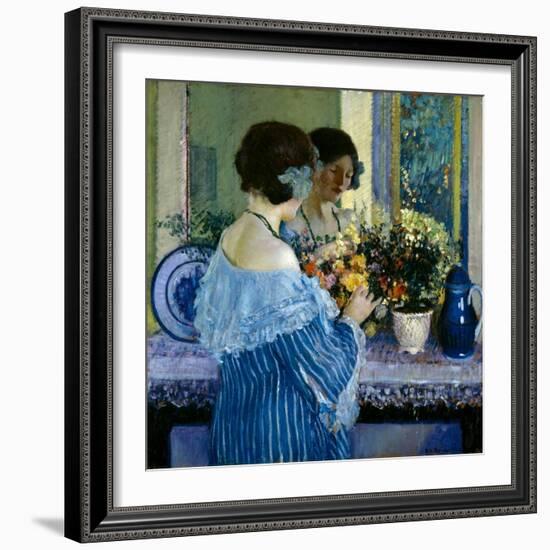 Girl in Blue Arranging Flowers (Oil on Canvas)-Frederick Carl Frieseke-Framed Giclee Print