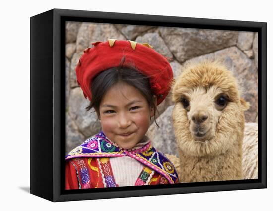 Girl in Native Dress with Baby Alpaca, Sacsayhuaman Inca Ruins, Cusco, Peru-Dennis Kirkland-Framed Premier Image Canvas