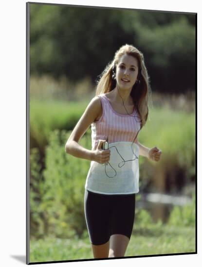 Girl Jogging with Headphones-null-Mounted Photographic Print