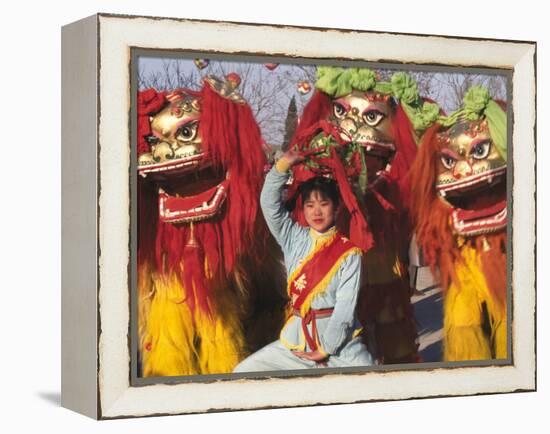 Girl Playing Lion Dance for Chinese New Year, Beijing, China-Keren Su-Framed Premier Image Canvas