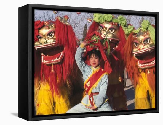 Girl Playing Lion Dance for Chinese New Year, Beijing, China-Keren Su-Framed Premier Image Canvas