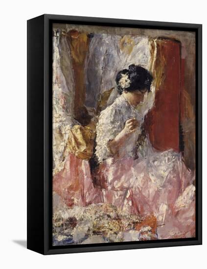 Girl Sewing (Elegantly Dressed Woman Sews in an Interior)-Antonio Mancini-Framed Stretched Canvas