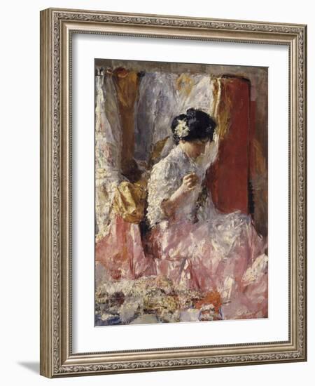 Girl Sewing (Elegantly Dressed Woman Sews in an Interior)-Antonio Mancini-Framed Art Print