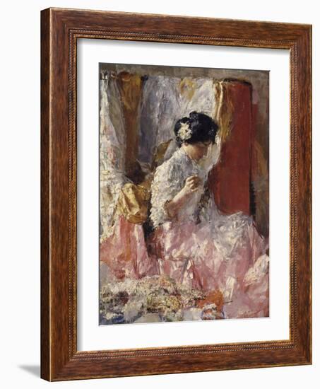 Girl Sewing (Elegantly Dressed Woman Sews in an Interior)-Antonio Mancini-Framed Art Print