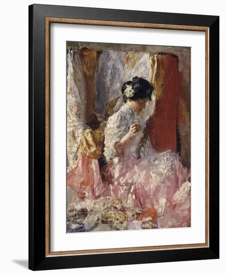 Girl Sewing (Elegantly Dressed Woman Sews in an Interior)-Antonio Mancini-Framed Art Print