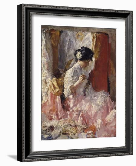 Girl Sewing (Elegantly Dressed Woman Sews in an Interior)-Antonio Mancini-Framed Art Print