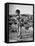 Girl Standing in Rubble from the Korean Civil War, Carrying a Baby in a Sling on Her Back-Joe Scherschel-Framed Premier Image Canvas