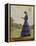 Girl Stands in a Field Reading Her Book-Harold Knight-Framed Premier Image Canvas