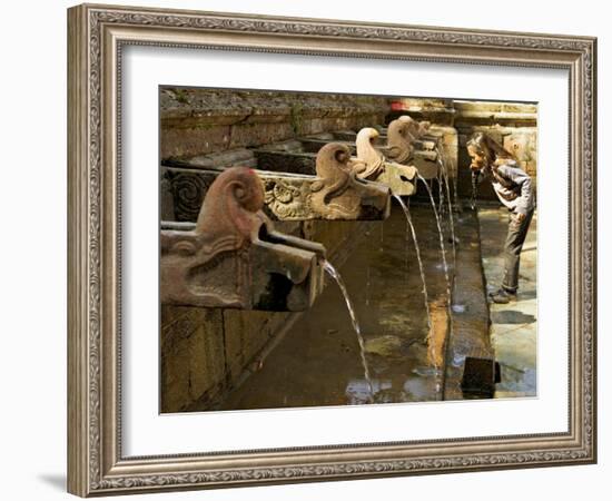 Girl Takes a Drink from the Water Spouts in a Temple Courtyard at Godavari in the Kathmandu Valley-Don Smith-Framed Photographic Print