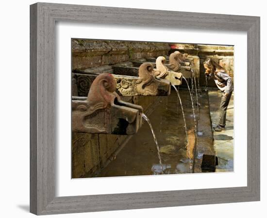 Girl Takes a Drink from the Water Spouts in a Temple Courtyard at Godavari in the Kathmandu Valley-Don Smith-Framed Photographic Print