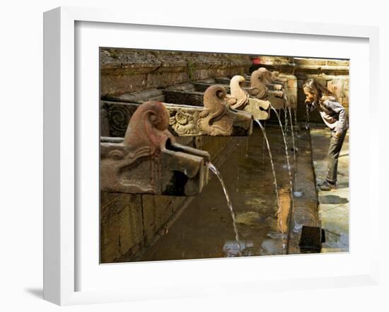 Girl Takes a Drink from the Water Spouts in a Temple Courtyard at Godavari in the Kathmandu Valley-Don Smith-Framed Photographic Print