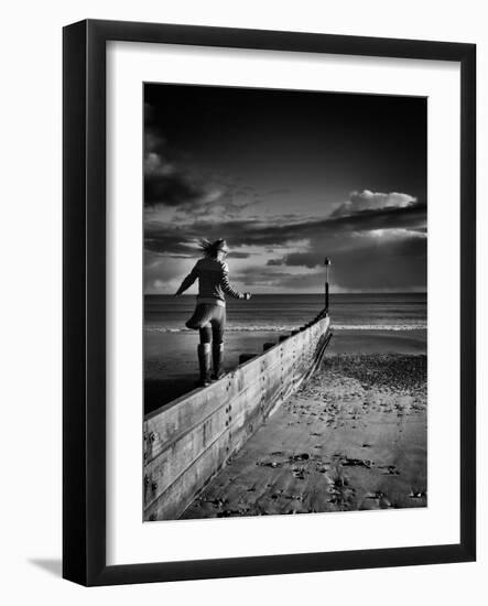 Girl Walking on Sea Defence-Rory Garforth-Framed Photographic Print