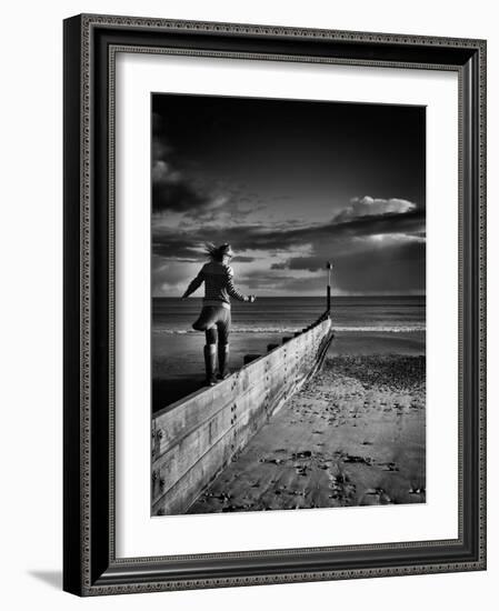 Girl Walking on Sea Defence-Rory Garforth-Framed Photographic Print