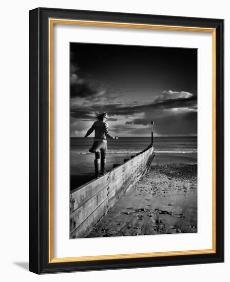 Girl Walking on Sea Defence-Rory Garforth-Framed Photographic Print