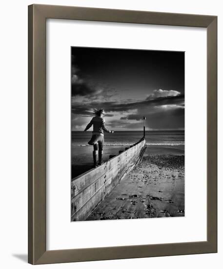 Girl Walking on Sea Defence-Rory Garforth-Framed Photographic Print