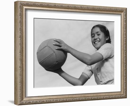 Girl with volley ball, Manzanar Relocation Center, 1943-Ansel Adams-Framed Photographic Print