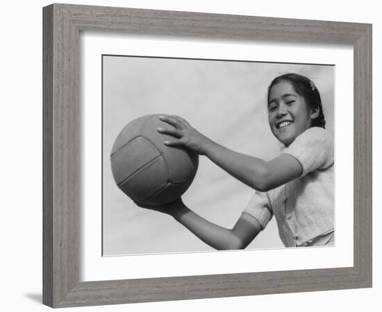 Girl with volley ball, Manzanar Relocation Center, 1943-Ansel Adams-Framed Photographic Print