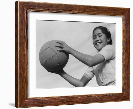 Girl with volley ball, Manzanar Relocation Center, 1943-Ansel Adams-Framed Photographic Print