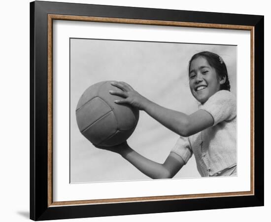 Girl with volley ball, Manzanar Relocation Center, 1943-Ansel Adams-Framed Photographic Print