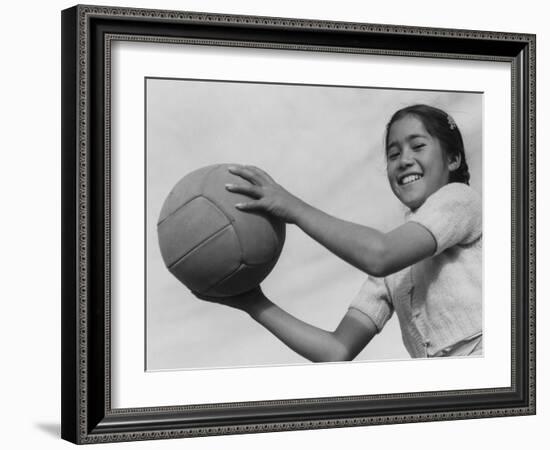 Girl with volley ball, Manzanar Relocation Center, 1943-Ansel Adams-Framed Photographic Print