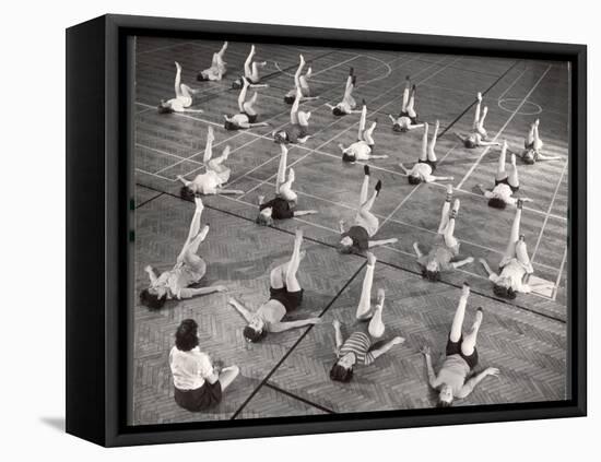 Girls and Women Doing Leg Exercise on Floor of Metropolitan Life Insurance Company's Gym-Herbert Gehr-Framed Premier Image Canvas