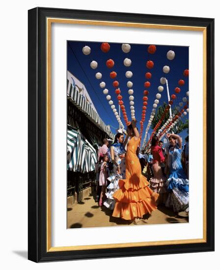 Girls Dancing a Sevillana Beneath Colourful Lanterns, Feria De Abril, Seville, Andalucia, Spain-Ruth Tomlinson-Framed Photographic Print