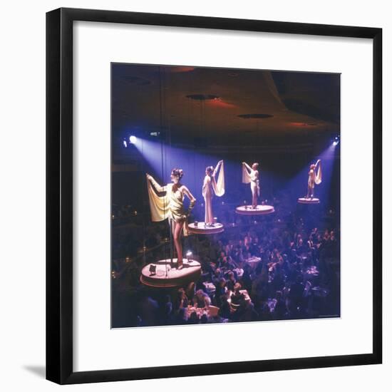 Girls from the Famed Paris Lido Show Performing on Raised Platforms at Stardust Hotel and Casino-Ralph Crane-Framed Photographic Print