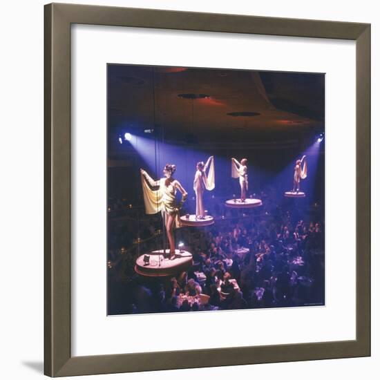 Girls from the Famed Paris Lido Show Performing on Raised Platforms at Stardust Hotel and Casino-Ralph Crane-Framed Photographic Print