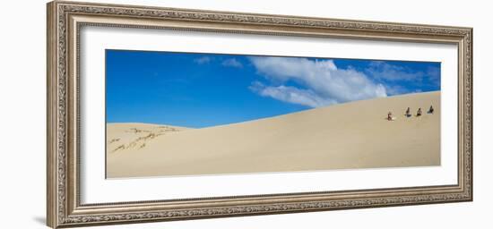 Girls getting ready to slide down the Te Paki Sand Dunes, Cape Reinga, Northland Region, North I...-null-Framed Photographic Print