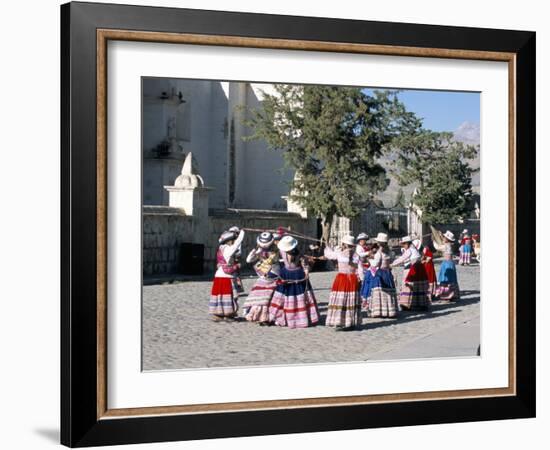 Girls in Traditional Local Dress Dancing in Square at Yanque Village, Colca Canyon, Peru-Tony Waltham-Framed Photographic Print