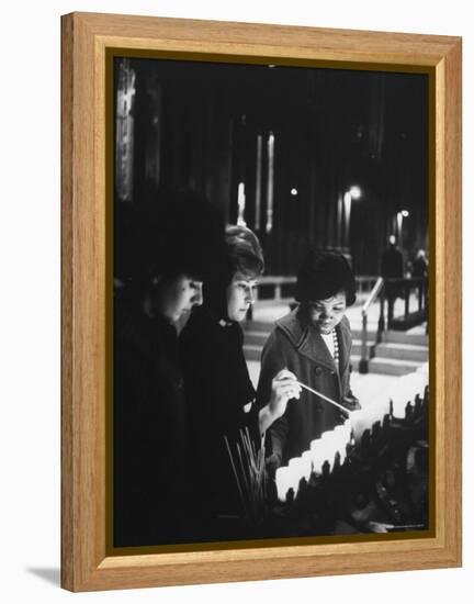 Girls Lighting Votive Candles at a Shrine in St. Patrick's Cathedral, in Prayer For John F. Kennedy-Ralph Morse-Framed Premier Image Canvas