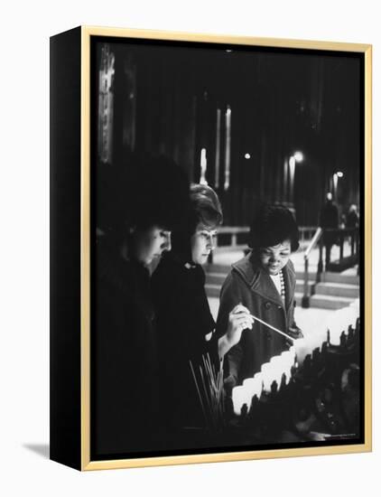 Girls Lighting Votive Candles at a Shrine in St. Patrick's Cathedral, in Prayer For John F. Kennedy-Ralph Morse-Framed Premier Image Canvas