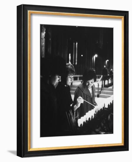 Girls Lighting Votive Candles at a Shrine in St. Patrick's Cathedral, in Prayer For John F. Kennedy-Ralph Morse-Framed Photographic Print