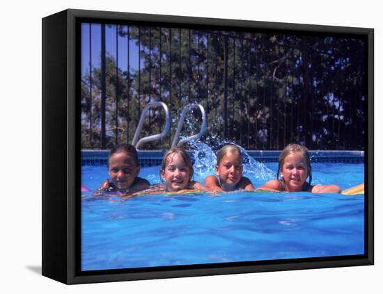 Girls on Float in Pool-Mark Gibson-Framed Premier Image Canvas