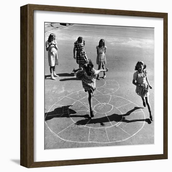 Girls Playing Hopscotch in the Street-Ralph Morse-Framed Photographic Print