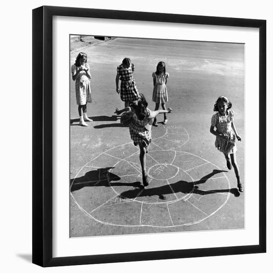 Girls Playing Hopscotch in the Street-Ralph Morse-Framed Photographic Print