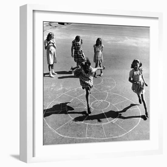 Girls Playing Hopscotch in the Street-Ralph Morse-Framed Photographic Print