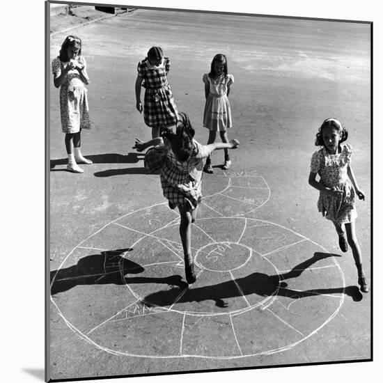 Girls Playing Hopscotch in the Street-Ralph Morse-Mounted Photographic Print