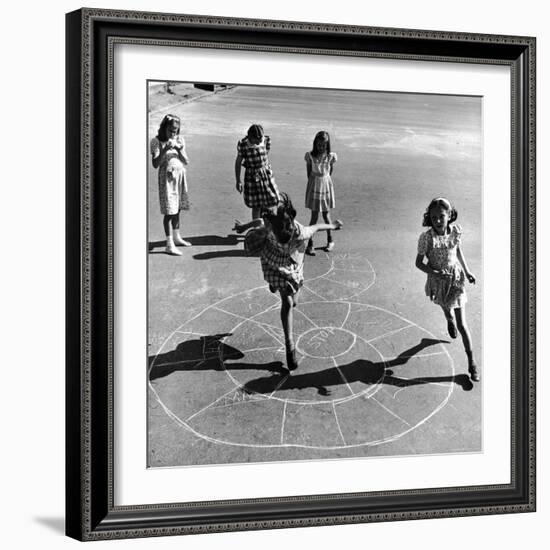 Girls Playing Hopscotch in the Street-Ralph Morse-Framed Photographic Print