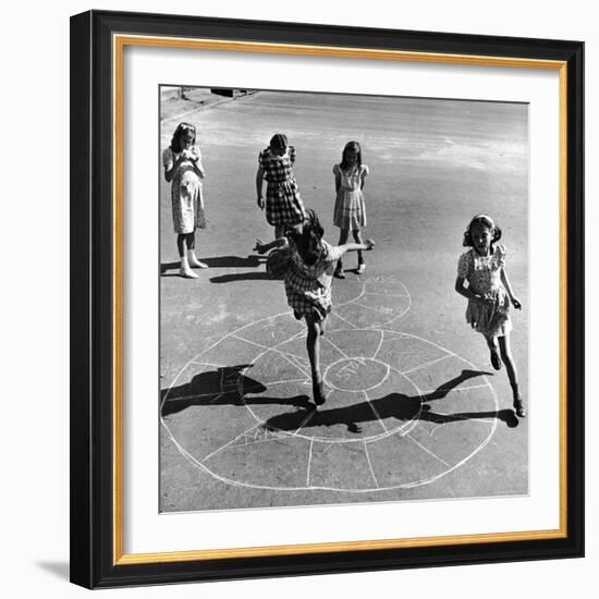 Girls Playing Hopscotch in the Street-Ralph Morse-Framed Photographic Print