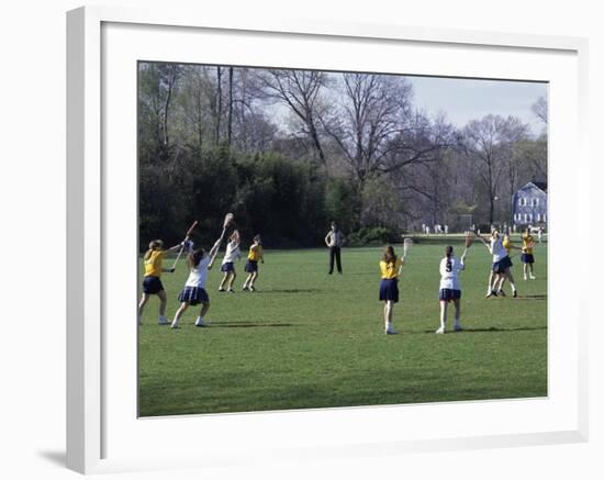 Girls Playing Lacrosse-null-Framed Photographic Print