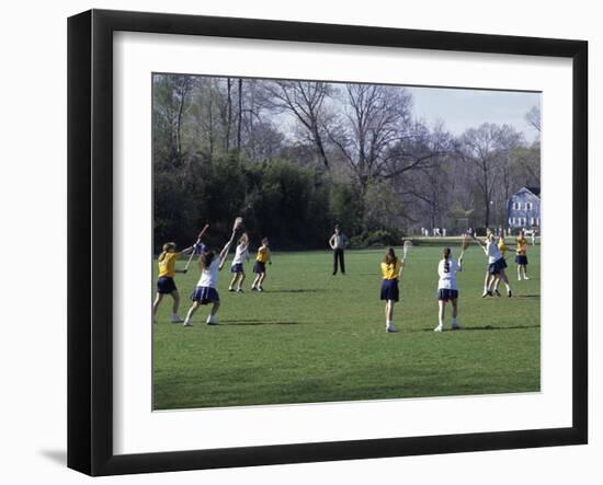 Girls Playing Lacrosse-null-Framed Photographic Print