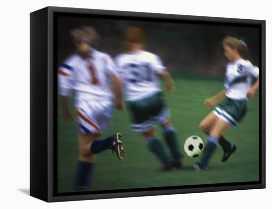 Girls Playing Soccer on a Field-null-Framed Premier Image Canvas